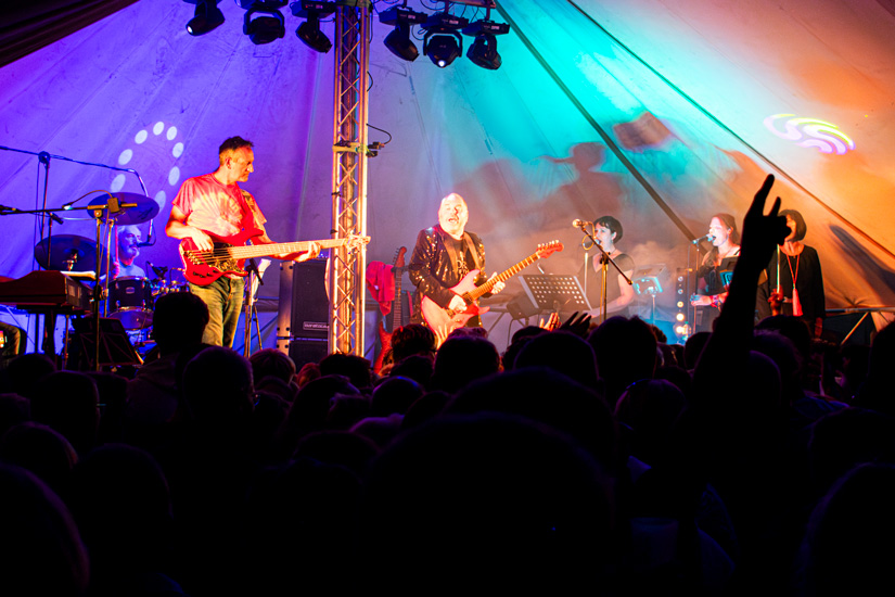 Live band performing in the marquee